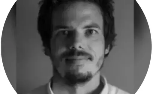 A man stares into the camera