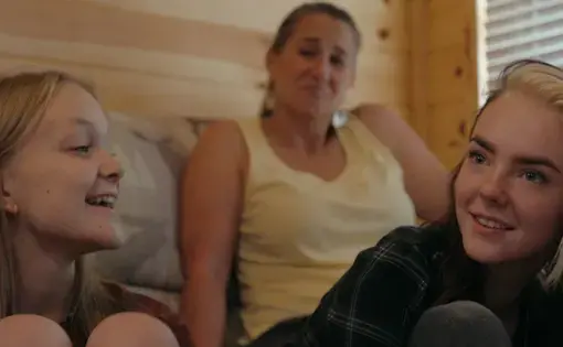 screen grab from The Talk, two girls and one woman sit to talk on a sofa