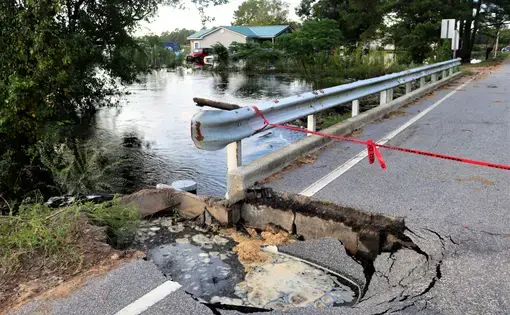 Bridge collapse near Lumberton, North Carolina, due to water rising from Hurricane Florence. United States, 2018.
