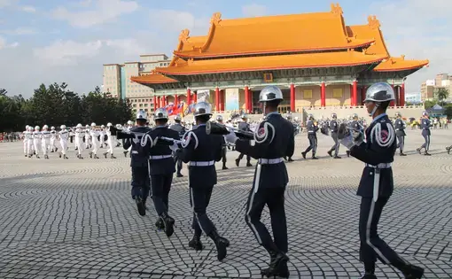 Soldiers marching in Chiang Kai Shek square, also known as Liberty square and Memorial hall, in the Taiwanese capital.