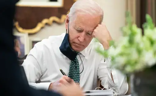 Joe Biden signing a document