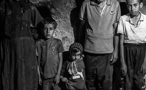 A family poses for a picture.