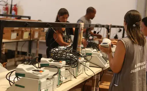 Loading electronic voting machines