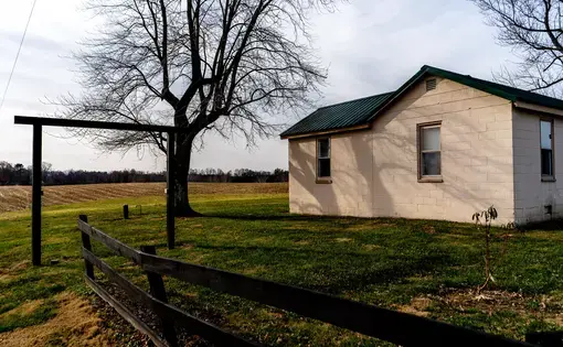 A house in a bucolic field