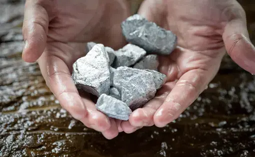 Metal in cupped hands