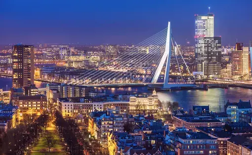 Rotterdam skyline with Erasmus bridge at twilight, the Netherlands. Image by mihaiulia/Shutterstock.