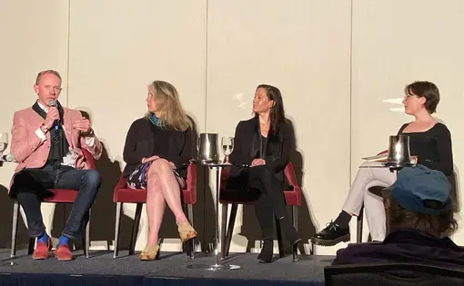 Public Events Coordinator Mikaela Schmitt moderates a panel with grantee filmmakers.