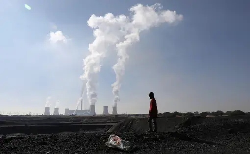 South Africa's energy transition aims to move away from coal-based power generation. Image by Siphiwe Sibeko for Reuters. Mpumalanga, South Africa, 2021