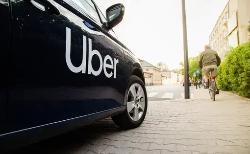 view of Uber car on street