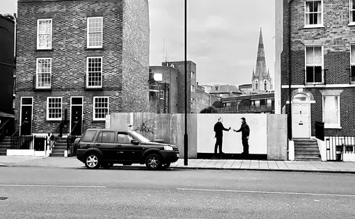 Street art in a London skyline