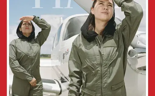 Far From Home - two Afghan fighter pilots stand in front of an airplane and look up to the sky