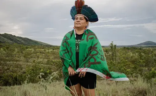 indigenous woman stares at the horizon