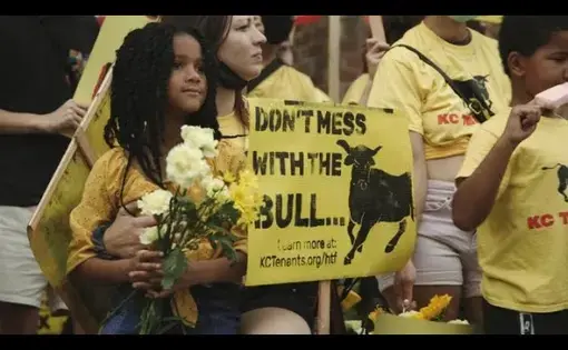 Protesters wearing yellow shirts