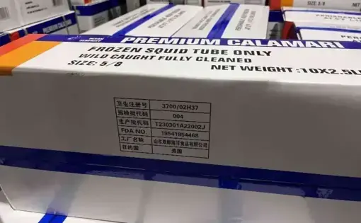 A stack of boxes marked 'premium calamari'.