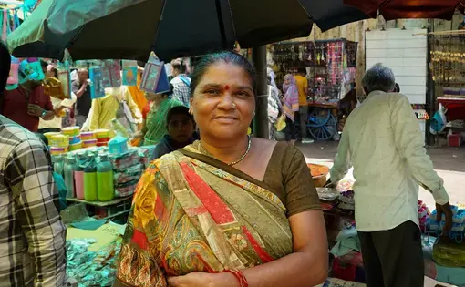 A woman in India smiling
