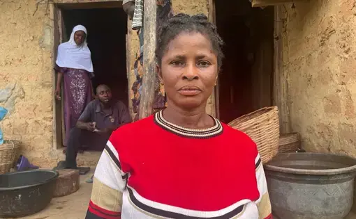 A woman in red t-shirt.