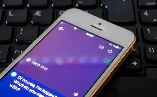 a smartphone with Chat GPT open with a message reading "help me!" Image by ARVD73/Shutterstock.