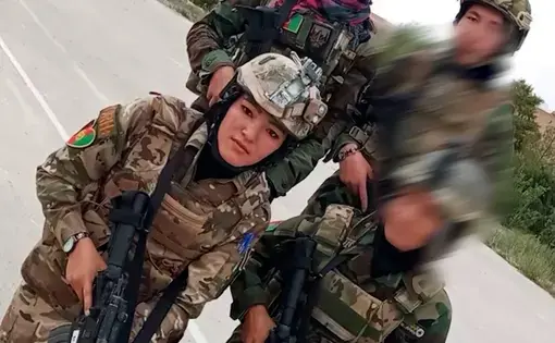 Afghani soldiers in uniforms, allied to the U.S.
