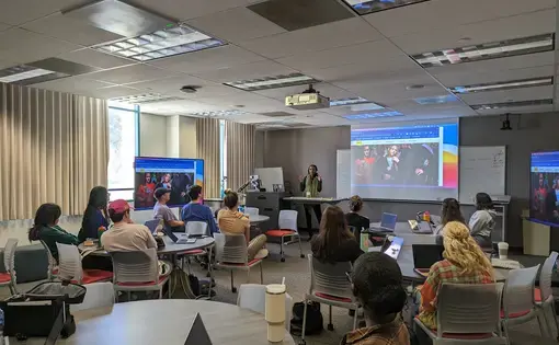 Lisa Armstrong speaks in from of a classroom at San Diego State University