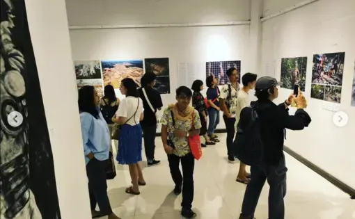 Visitors view the art exhibition
