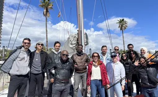 The ORN fellows pose for a photo on a boat