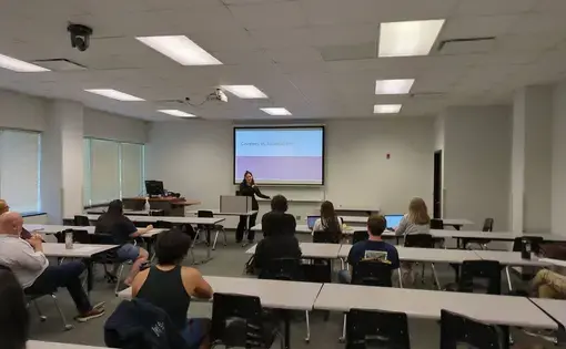 Rosa presents to a classroom at Forsyth
