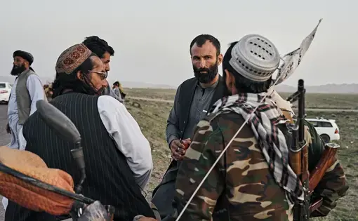 International journalist Jason Motlagh interviewing Taliban fighters in Afghanistan.