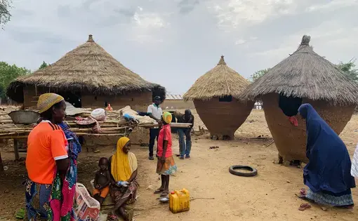 Women in a compound used to illustrate a story. Image by Taiwo Adebulu. Nigeria, 2024.