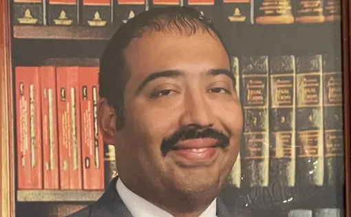 Juan Flores headshot