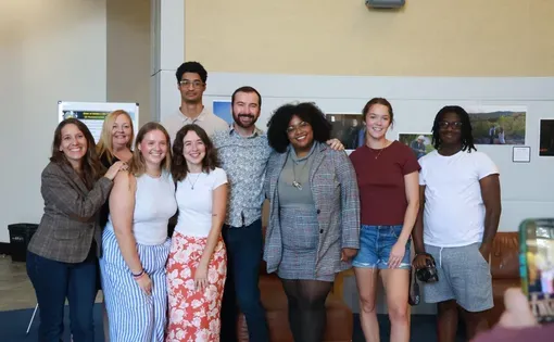 A group of people pose for a photo