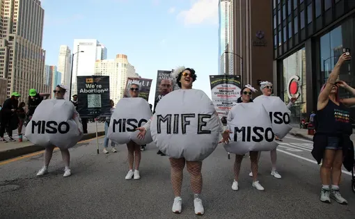 Chicago, Il, USA - Aug. 18, 2024: Pro-choice demonstrators promote accessibility to abortion pills on the evening before the start of the Democratic National Convention. Image by Vic Hinterlang/Shutterstock.