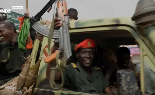 Militants drive by on a pick up truck