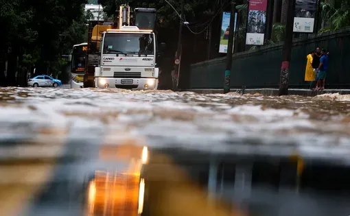 Rio de Janeiro, Brazil April 09, 2019 a truck crosses a flooded street in Rio de Janeiro where 10 people dead on April 08 and 09 due to strong rains. Image by Antonio Scorza/Shutterstock.