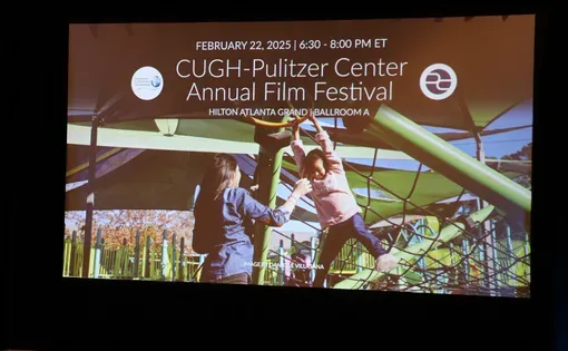 photo of screen at CUGH film festival showing event title