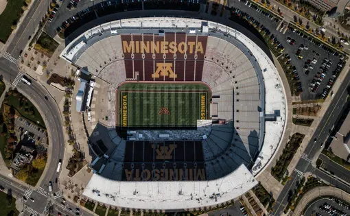 MINNEAPOLIS, MN/USA - October 20, 2017: TCF Bank Stadium on the campus of the University of Minnesota. TCF Bank is an outdoor stadium and home to the Minnesota Golden Gophers football team. Image by Aerial_Shots/Shutterstock.