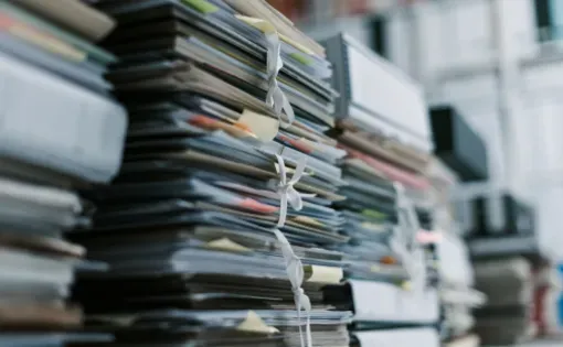 Stacks of binders filled with paperwork