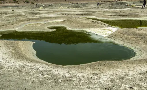 Salt crater in Isiolo county The locals harvest the salt from the different coloured pools and sell it to tourists that visit.