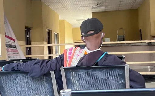 Man sitting in health clinic