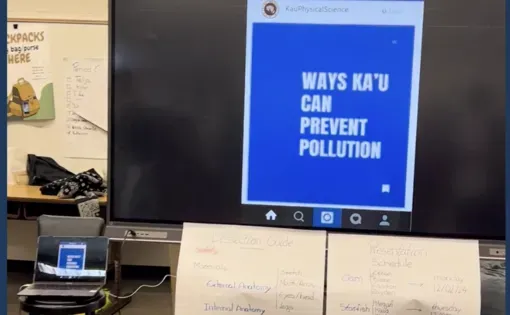 A screen projects the Instagram carousels created by students to communicate the impacts of health pollution to their communities. The screen is displayed in a classroom.