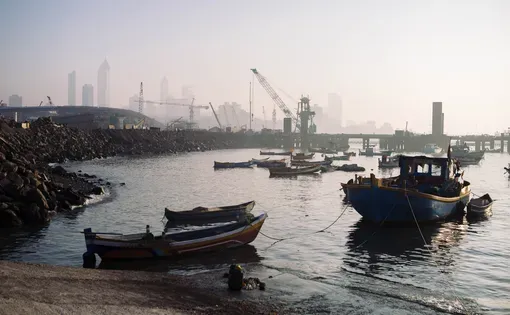 A view of fishing boats along the polluted Mumbai coast
