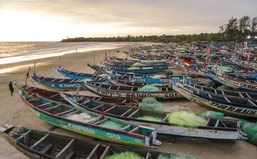 Boats piled up next to each other.