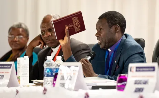 Bishop Rev. Gift Machinga speaks to delegates