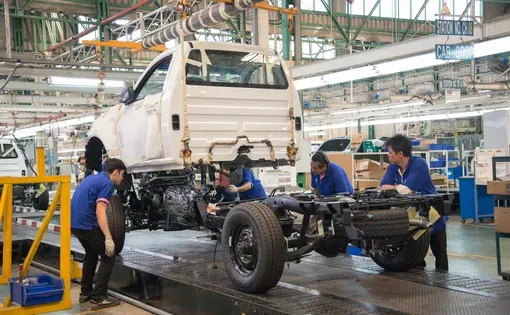 SAMUTPRAKARN, THAILAND - DEC 2015: Workers assembles chassis of pickup cars at Cars factory, December 2015 in Thailand. Image by Artigone Pumsirisawas/Shutterstock.