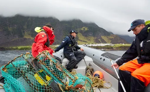 Fishers on a boat off Tristan da Cunha island