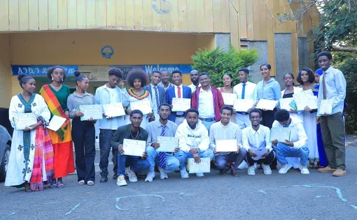 People pose for photo