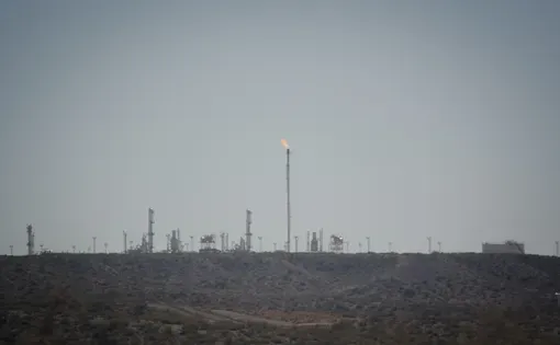 Hazy image with factory in the back