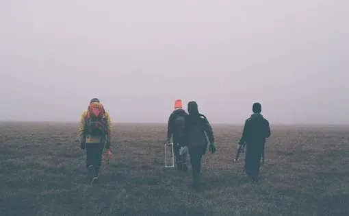 Researchers walking in the tundra of Alaska on a recent expedition from the Society for the Protection of Underground Networks. (Max Levy)