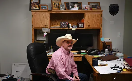 Roosevelt County Sheriff Jason Frederick sits for a portrait in his office, April 27, 2026, at the Roosevelt County Sheriff’s Office in Wolf Point. Credit: Lauren Miller, Montana Free Press, CatchLight Local/Report for America