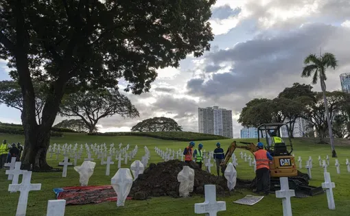 Cemetery crews in 2018 exhume the remains of U.S. service members at the Manila American Cemetery as part of the DPAA’s efforts to identify soldiers who died at the Cabanatuan POW camp in the Philippines during World War II. (Photo courtesy of American Battle Monuments Commission)