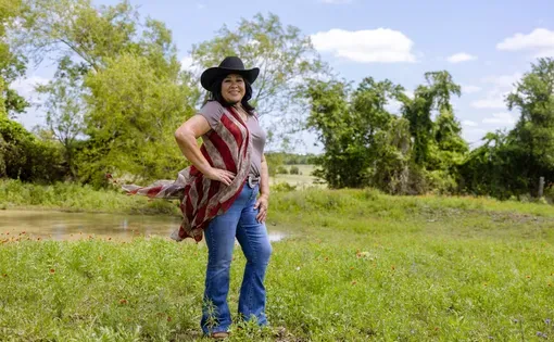 Rena Schroeder poses for a portrait on her ranch where she runs an equine learning nonprofit and cares for rescue livestock in Lott on May 4, 2026. Leila Saidane for The Texas Tribune